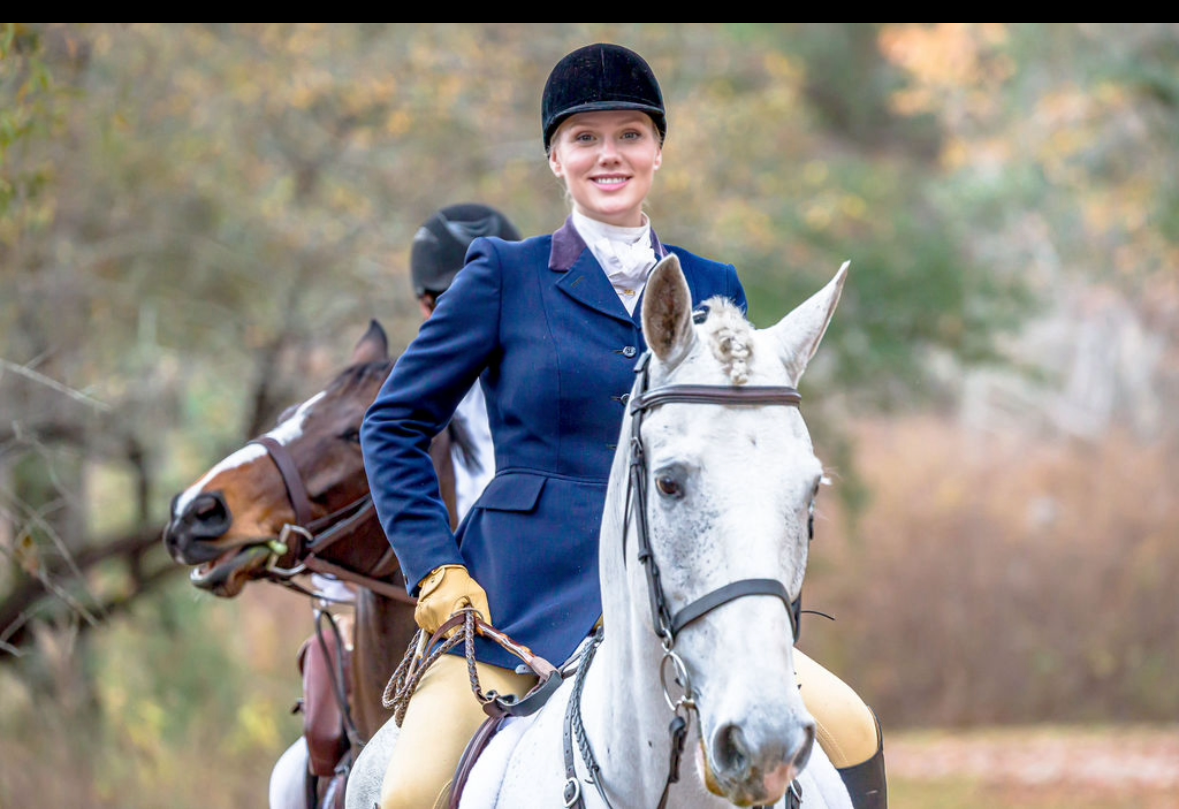 Helen Hagood Critz mounted on a gray horse