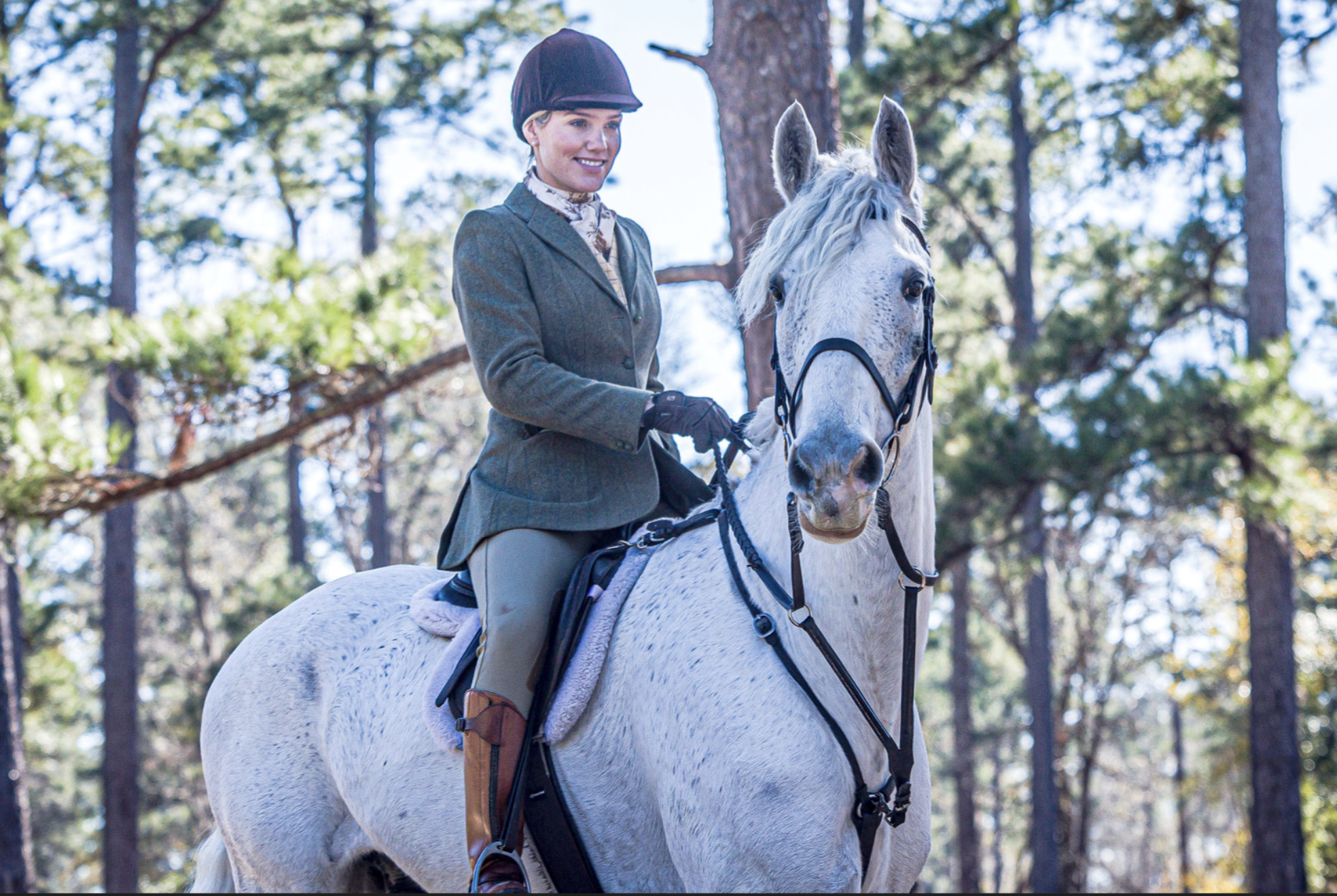 Original club Staff page photograph of mounted hunt staff.